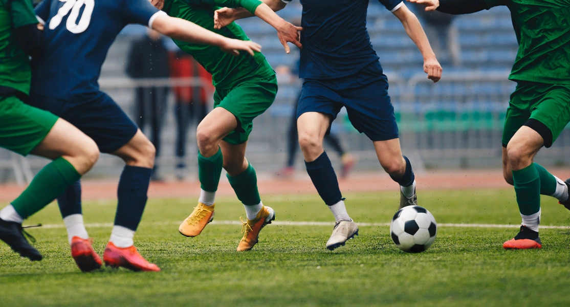 Men playing soccer