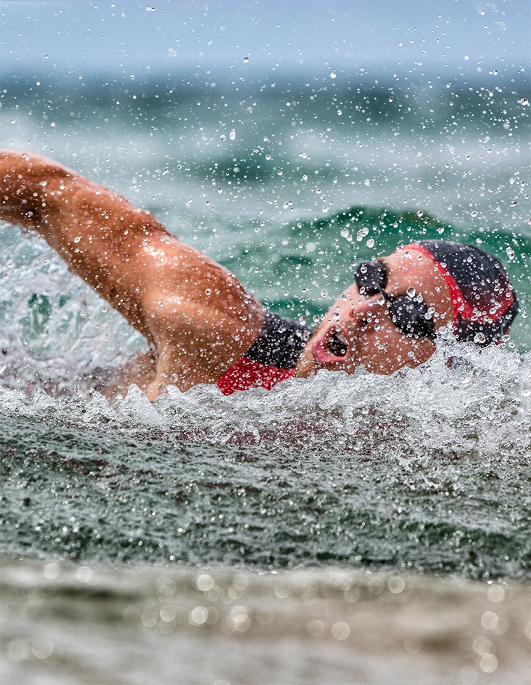 An athlete swimming in the ocean